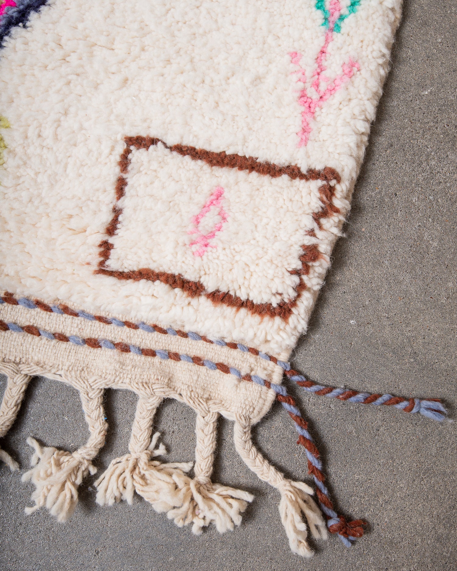 Modern, designer, handcrafted Berber rug from Morocco. Beniourain carpet with beautiful colours and patterns and fluffy wool texture.